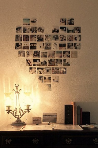Polaroids en la pared formando un ♥